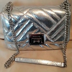Michael Kors Vivianne silver embossed leather purse, new never used.